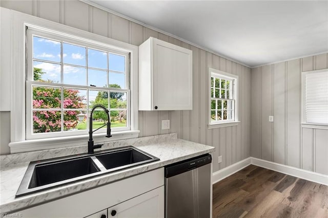 506 W 26th St, Winston-Salem, NC 27105 - kitchen with stainless steel dishwasher, dark wood-type flooring, white cabinets, crown molding, and light stone countertops