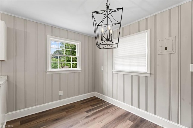 506 W 26th St, Winston-Salem, NC 27105 - unfurnished dining area featuring a chandelier and dark wood-style flooring