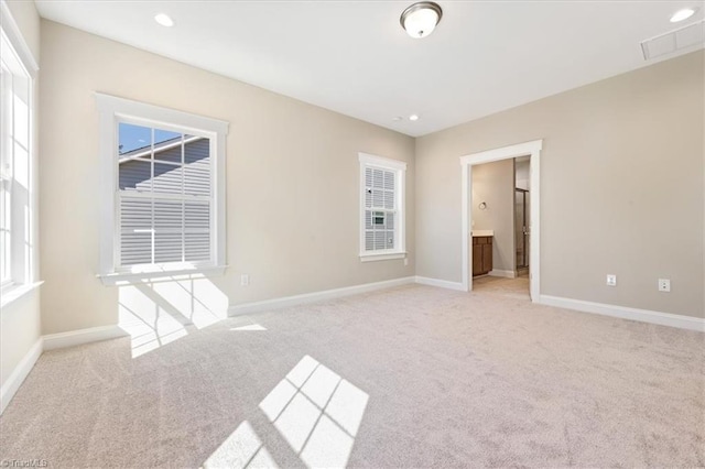 1811 Parham Dr Unit 89, Graham, NC 27253 - unfurnished room featuring light carpet, a healthy amount of sunlight, and baseboards