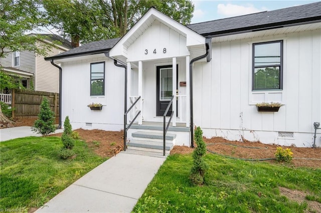 348 E Sprague St, Winston-Salem, NC 27127 - view of front of home featuring crawl space and board and batten siding