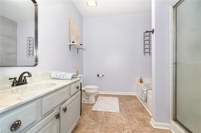 1029 Robbins St, Asheboro, NC 27203 - bathroom featuring vanity, a garden tub, and a shower with door