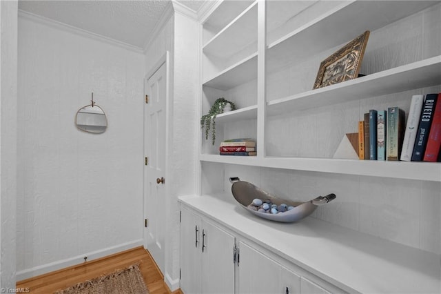 4701 Brock Dr, Hurdle Mills, NC 27541 - detailed view of crown molding, wood finished floors, and baseboards