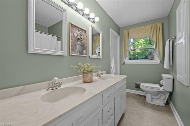4701 Brock Dr, Hurdle Mills, NC 27541 - bathroom featuring toilet, double vanity, baseboards, and a textured ceiling