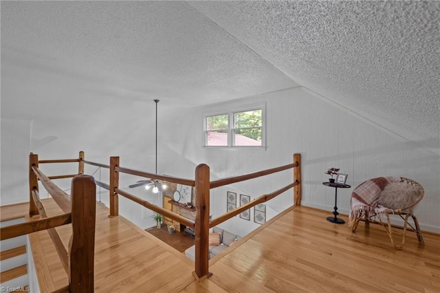 4701 Brock Dr, Hurdle Mills, NC 27541 - additional living space featuring a textured ceiling, wood finished floors, lofted ceiling, and ceiling fan