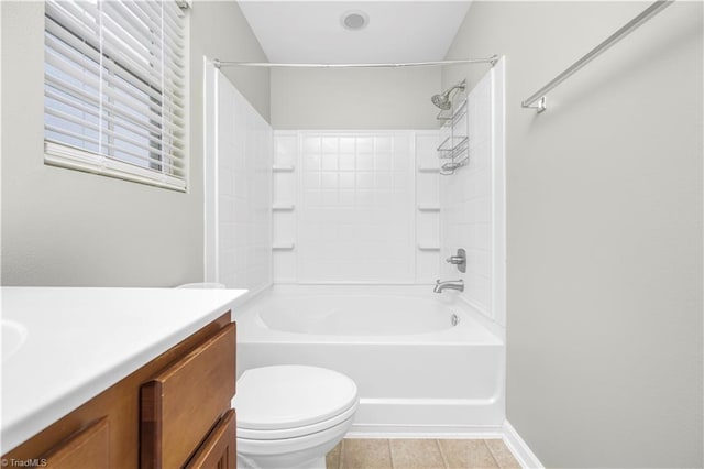 full bath with tile patterned flooring, tub / shower combination, vanity, and toilet