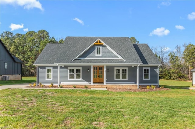 view of front of house with a front lawn and a porch