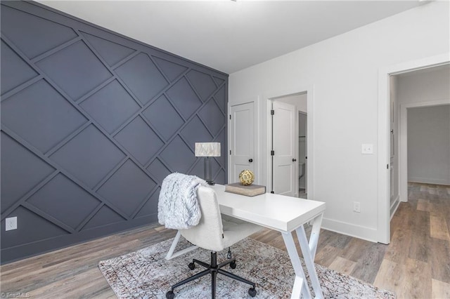 home office featuring hardwood / wood-style flooring