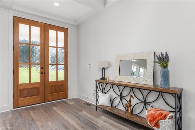 entryway with french doors, hardwood / wood-style flooring, crown molding, and a healthy amount of sunlight