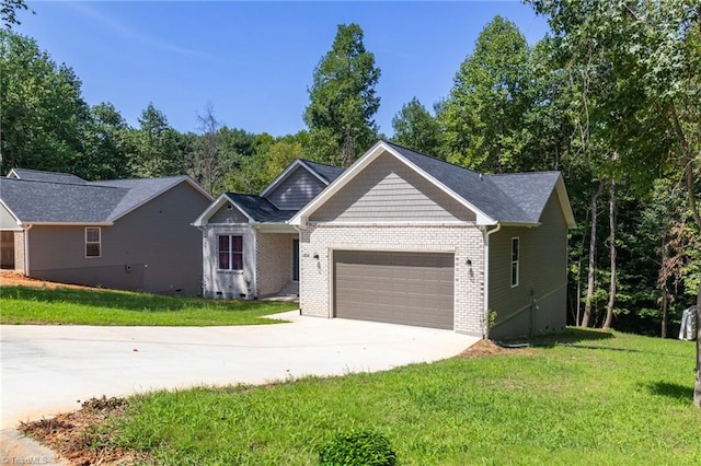 ranch-style home featuring a garage and a front yard