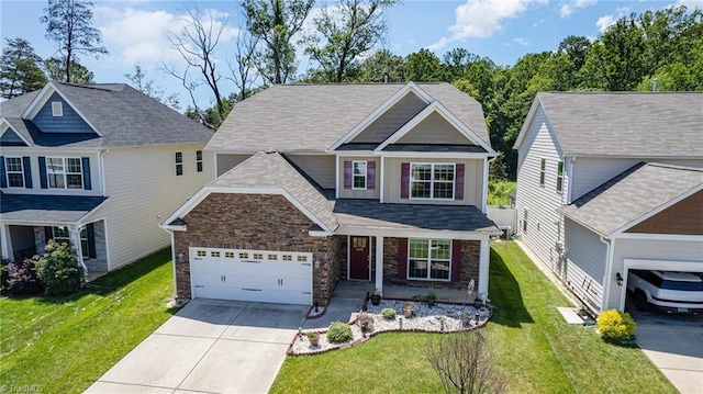 5473 Noble View Dr Unit 12, Colfax, NC 27235 - craftsman inspired home featuring driveway, a front yard, stone siding, and an attached garage