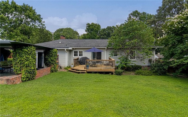 509 Florham Dr, High Point, NC 27262 - back of house with a deck, a yard, a chimney, and a patio