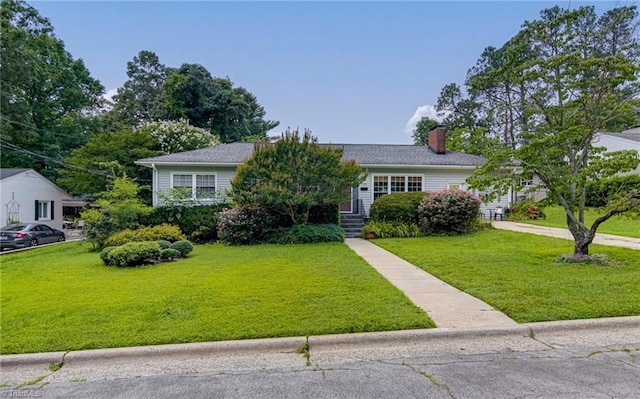 509 Florham Dr, High Point, NC 27262 - view of front of home featuring a chimney and a front yard