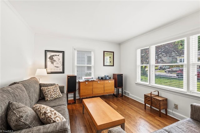 2075 Craig St, Winston-Salem, NC 27103 - living area with healthy amount of natural light, ornamental molding, dark wood finished floors, and baseboards