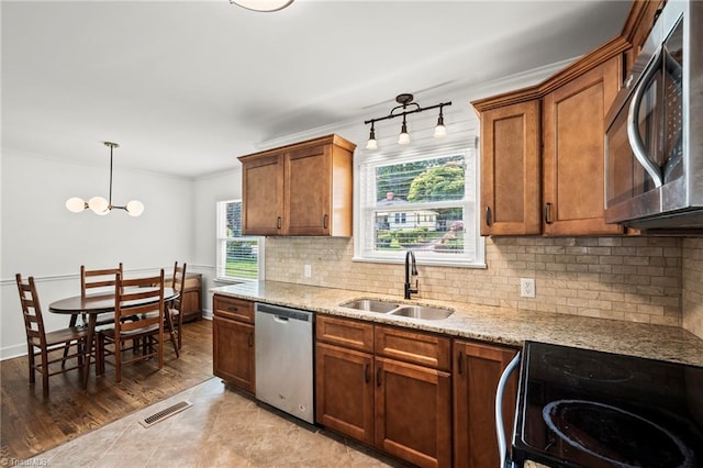 2075 Craig St, Winston-Salem, NC 27103 - kitchen with dishwasher, a sink, black electric range, backsplash, and ornamental molding