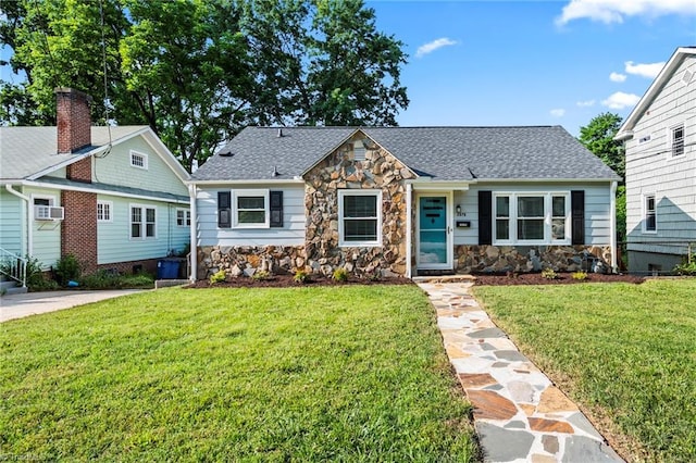 2075 Craig St, Winston-Salem, NC 27103 - view of front of property with stone siding, a front lawn, and cooling unit