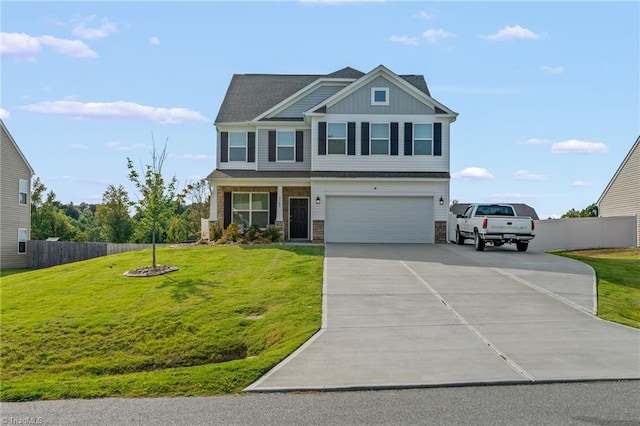 view of front of house featuring a garage and a front yard