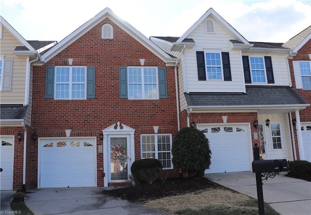 view of front of property with a garage