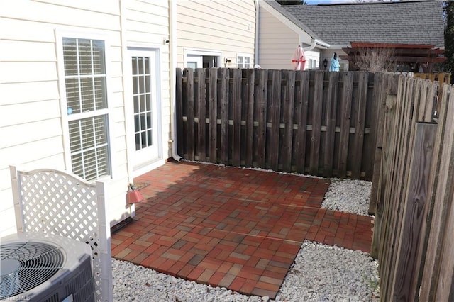 view of patio featuring cooling unit