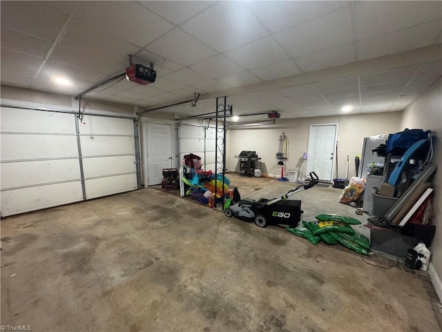garage featuring a garage door opener