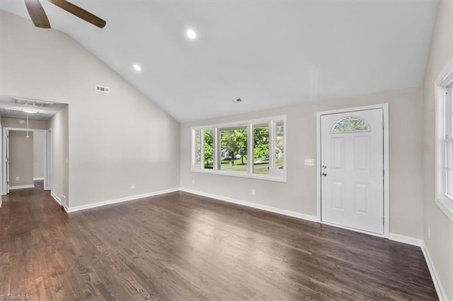 foyer featuring high vaulted ceiling, dark hardwood / wood-style floors, and ceiling fan