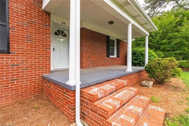 view of patio featuring a porch