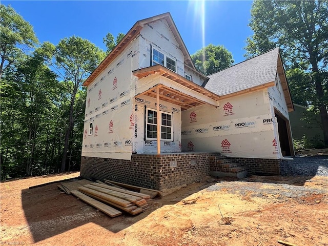 848 Hidden Ct, Asheboro, NC 27205 - view of side of property with roof with shingles