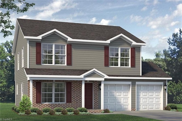 view of front of home with a garage and a front yard