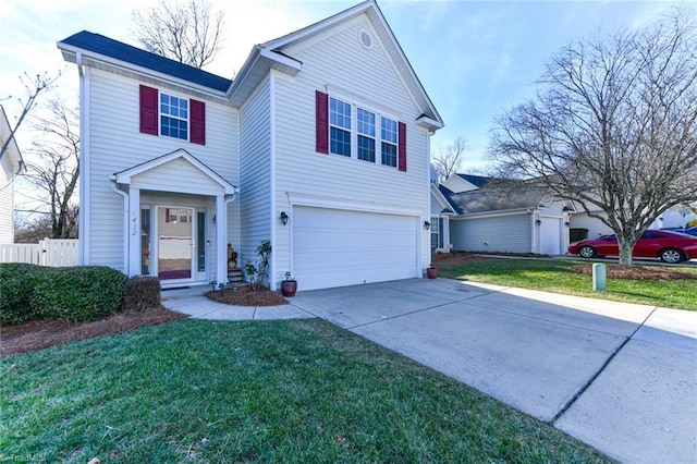 view of front of house with a garage and a front lawn