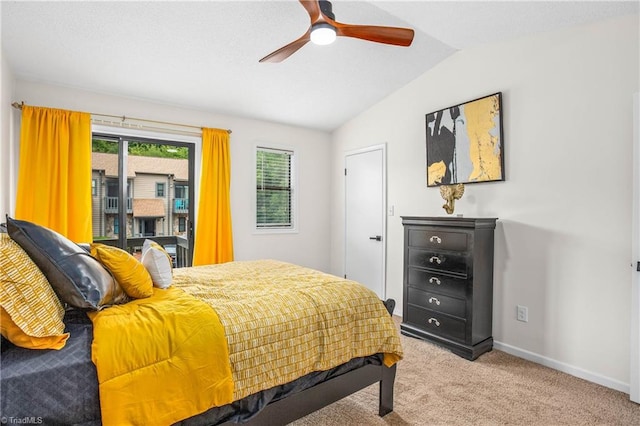 bedroom with vaulted ceiling, ceiling fan, and light colored carpet