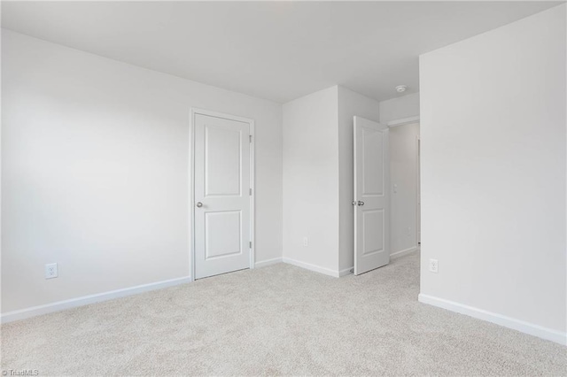 2126 Monk Dr, Haw River, NC 27258 - carpeted spare room featuring baseboards
