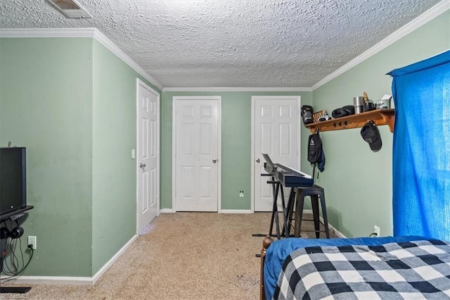 carpeted bedroom featuring ornamental molding and a textured ceiling