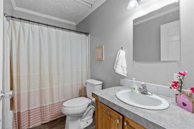 full bathroom featuring vanity, ornamental molding, a textured ceiling, and toilet