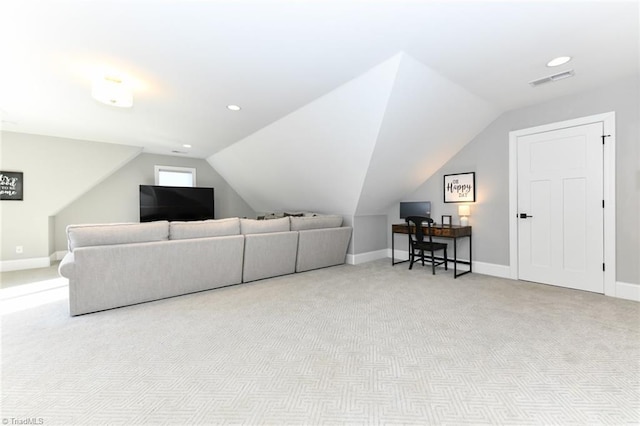 living room with light colored carpet and lofted ceiling