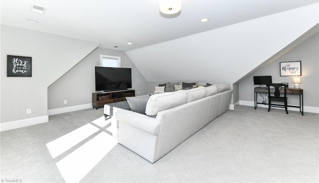 living room featuring light carpet and lofted ceiling