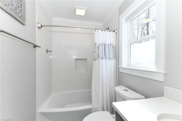 full bathroom featuring toilet, shower / tub combo, plenty of natural light, and vanity