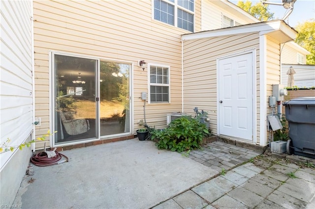 property entrance with a patio