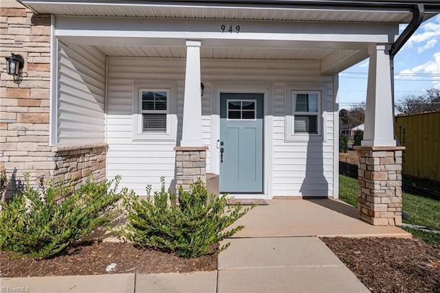 property entrance with a porch