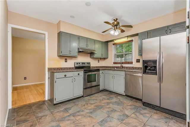 kitchen featuring sink, ceiling fan, and appliances with stainless steel finishes