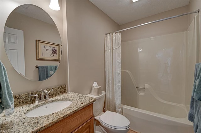 full bathroom with shower / tub combo with curtain, vanity, and toilet