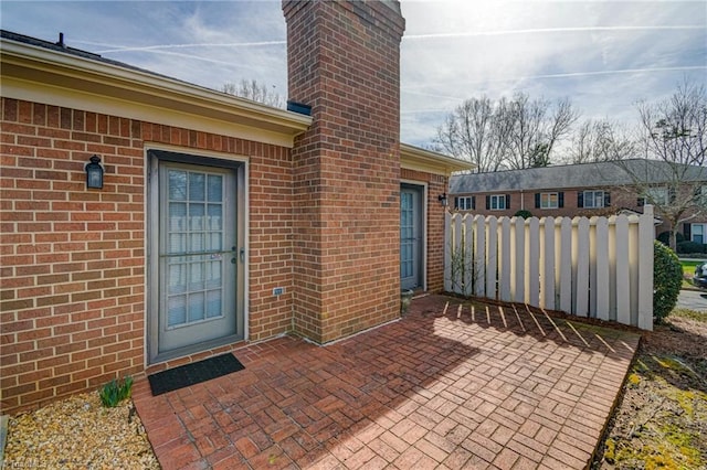 doorway to property with a patio