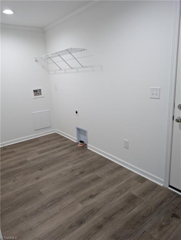 laundry area featuring hookup for a washing machine, crown molding, electric dryer hookup, and dark wood-type flooring