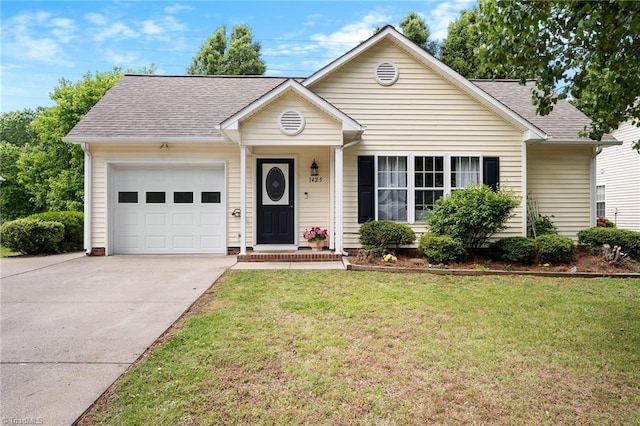 ranch-style house with an attached garage, driveway, a shingled roof, and a front lawn