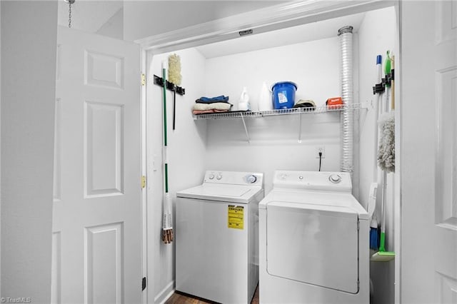 laundry room with separate washer and dryer