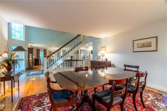 dining area with hardwood / wood-style floors