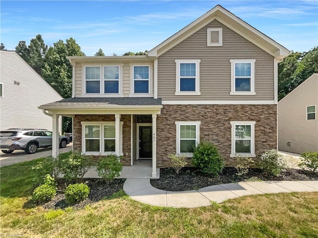 view of front of house with a front lawn