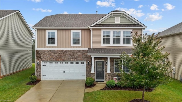 craftsman-style home with a front yard and a garage