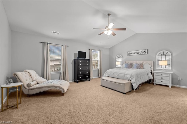 carpeted bedroom featuring vaulted ceiling and ceiling fan