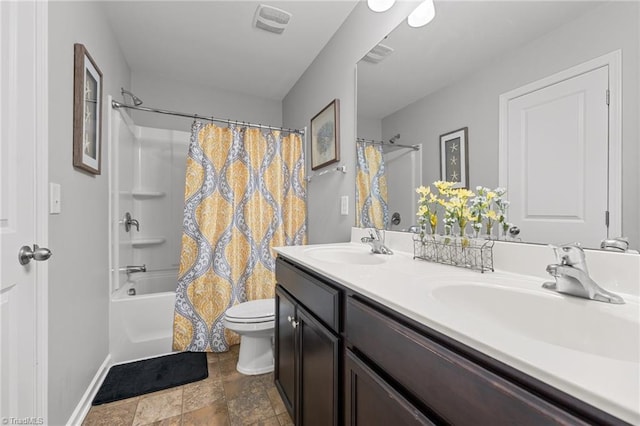 full bathroom with shower / bath combo, vanity, and toilet