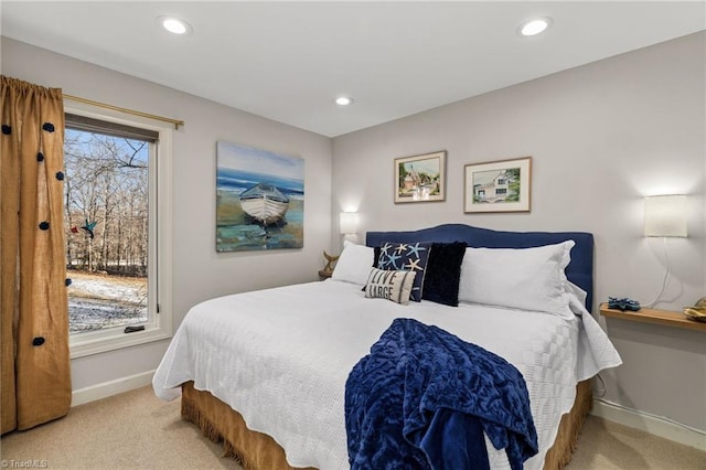 bedroom featuring light colored carpet