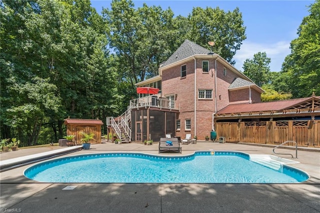 8040 Crosscreek Trl, Pfafftown, NC 27040 - swimming pool with stairway, a patio area, and a wooden deck